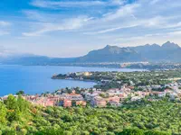 The 56-metre-long (184-foot) Bayesian, with its majestic single 72-metre mast, was moored off the small port of Porticello. Credit: Adobe Stock/R