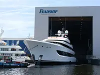 Feadship celebrates another milestone as Project 827 emerges from the shed at the Amsterdam facility. Credit: Feadship
