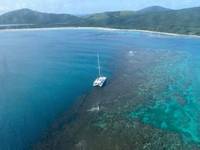 The yacht Obsession sits hard aground on a reef just off Flamenco Beach in Culebra, Puerto Rico. (Photo: U.S. Coast Guard)