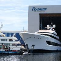 Feadship celebrates another milestone as Project 827 emerges from the shed at the Amsterdam facility. Credit: Feadship