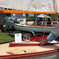 Richard Honan of Winthrop, MA, with his boat Proud Mary II, the 2014 winner of the “I Built it Myself” Award sponsored by Interlux® at the WoodenBoat Show.