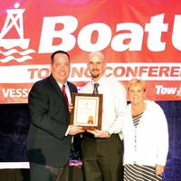 (left to right) BoatUS V.P. and Director of Towing Services Adam Wheeler, TowBoatUS Chickamauga Captain Shane O’Neil and Stacey O’Neil