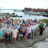 Several volunteers of the Chesapeake Bay Maritime Museum gathered at a reception honoring their service and dedication. Last year, more than 275 volunteers collectively contributed 28,235 hours of service to the nonprofit, helping with all aspects of CBMM’s operations. (Photo: CBMM)