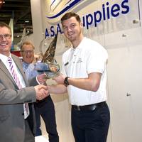 Shaun Wigley - Managing Director accepting the ‘Sales growth achievement award 2014’ on behalf of the team at A.S.A.P. Supplies by Adrian Foster - UK Marketing Manager at Parker Racor. Peter Edwards with his award in the background (Photo: A.S.A.P Supplies)
