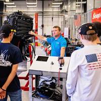 Torey Roberts, Mercury technical accounts manager, speaks with students at Fred K. Marchman Technical College in New Port Richey, Fla. (Photo: Mercury Marine)