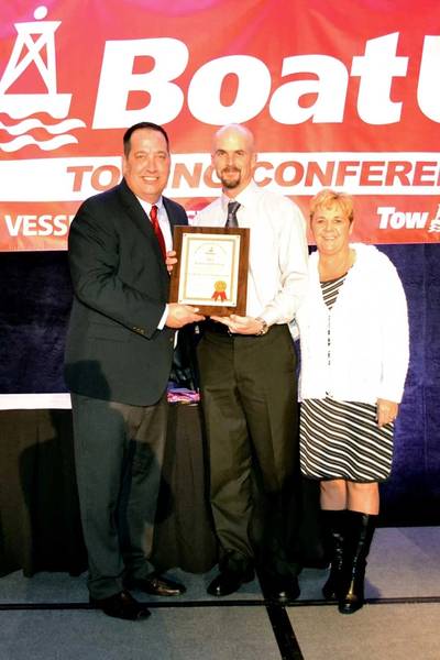 (left to right) BoatUS V.P. and Director of Towing Services Adam Wheeler, TowBoatUS Chickamauga Captain Shane O’Neil and Stacey O’Neil