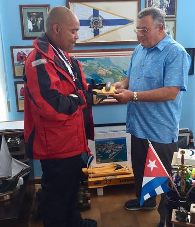 Victor Mooney with Comodoro, Jose Escrich at Club Nautico International Hemingway de Cuba in Havana.