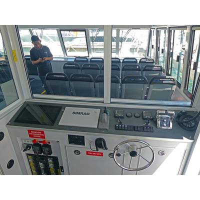 All controls are centralized in a compact wheelhouse on the starboard side, an arrangement that enables the Master to dock the ferry singlehandedly and monitor passenger flows without leaving the control station. Photo: Dongara Marine