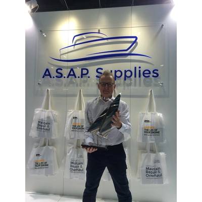 Peter Edwards and his ‘Lifetime Achievement Award’ on the A.S.A.P. Supplies stand at the recent London Boat Show 2015. (Photo: A.S.A.P Supplies)