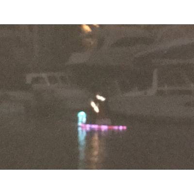 Santa on a paddle board. West End Boat Parade, New Basin Canal. New Orleans. Photo by Lisa Overing