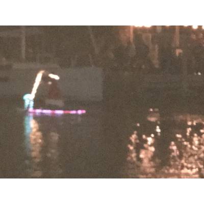 Santa on a paddle board. West End Boat Parade, New Basin Canal. New Orleans. Photo by Lisa Overing