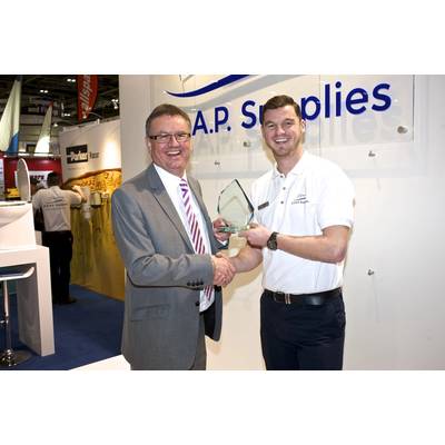 Shaun Wigley - Managing Director accepting the ‘Sales growth achievement award 2014’ on behalf of the team at A.S.A.P. Supplies by Adrian Foster - UK Marketing Manager at Parker Racor. (Photo: A.S.A.P Supplies)