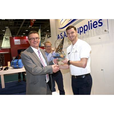 Shaun Wigley - Managing Director accepting the ‘Sales growth achievement award 2014’ on behalf of the team at A.S.A.P. Supplies by Adrian Foster - UK Marketing Manager at Parker Racor. Peter Edwards with his award in the background (Photo: A.S.A.P Supplies)