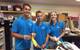 From left: Volvo Penta interns William Bratt, Noah LeGrand and Christina McLemore pitch in as volunteers at the Union Mission (Photo: Volvo Penta)